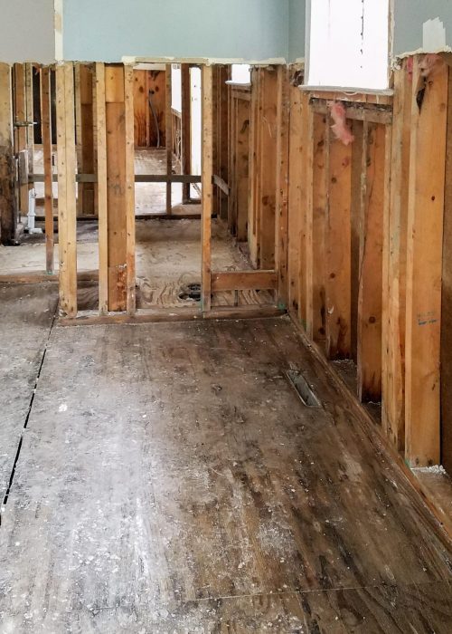 After mucking-out, there are clear sightlines from the master bedroom through the bathroom to the living room