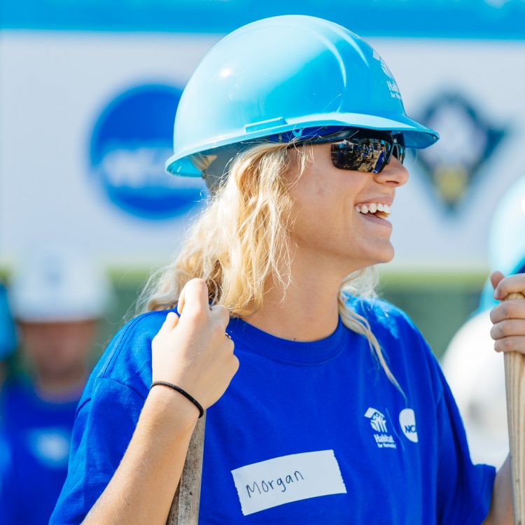 WILMINGTON, North Carolina (4/27/2019) - Student athlete volunteers from University of North Carolina Wilmington (UNCW), and the NCAA work on two different homes with Habitat for Humanity Cape Fear.